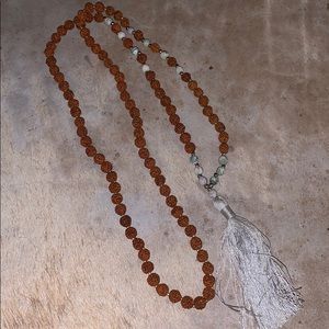 Tassel necklace in burnt orange/grey